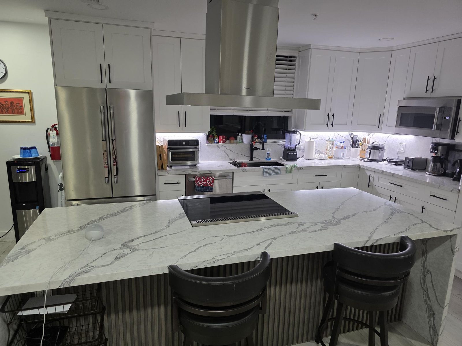 Kitchen with island at Mary's House ALF in Palmetto Bay